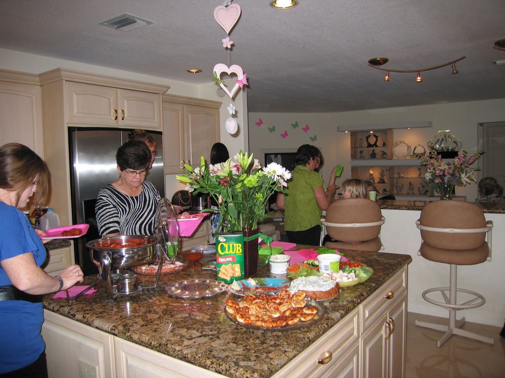 We have these awesome granite countertops in our updated kitchen - here's a pic from a party we recently threw!