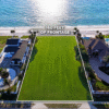 Aerial of 1420 and 1440 Gulf Boulevard, Belleair Shore, Florida — two contiguous Gulf-front parcels offered as a 160-foot legacy estate site.