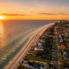 Aerial view of St. Petersburg Florida waterfront skyline at sunset with Gulf in the background